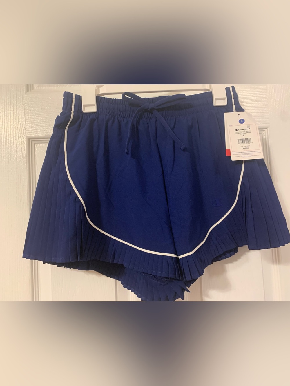Champion NWT’s size small skort (waist 14 1/4”) before stretch